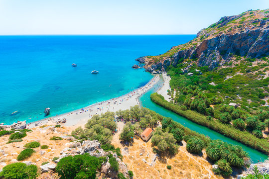 View of Preveli beach at Libyan sea, river and palm forest, southern Crete , Greece