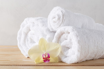 Fototapeta na wymiar towels roll with flower