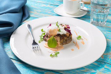 Meat cutlets on a wooden board