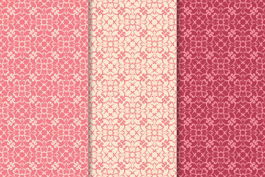 Set of floral ornaments. Cherry red vertical seamless patterns