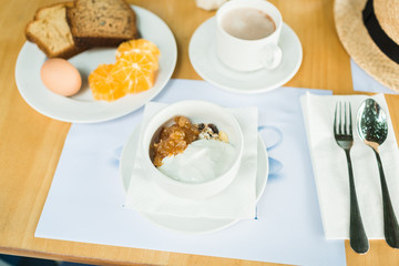 morning breakfast, muesli with yoghurt, eggs