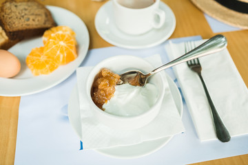 morning breakfast, muesli with yoghurt, eggs