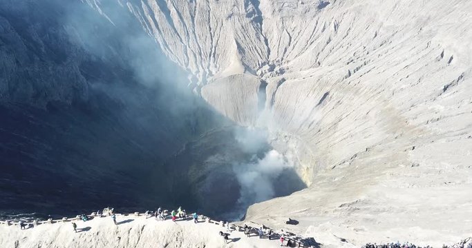 Mountain Bromo active volcano crater in East Jawa, Indonesia. Top view from drone fly. 4K footage