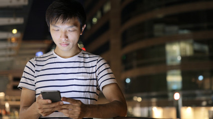 Asian man use of smart phone