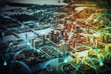 Miniature model city and communication network concept. IoT(Internet of Things). ICT(Information communication network). abstract mixed media.