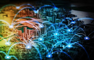 Miniature model city and communication network concept. IoT(Internet of Things). ICT(Information communication network). abstract mixed media.
