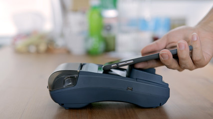 Using Credit Card Terminal at shop