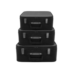 Retro style - Three black vintage suitcase. Isolated