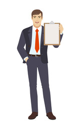 Businessman with hand in pocket holding clipboard