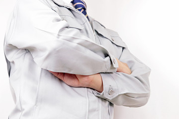 作業着 男性 ネクタイ ポーズ 腕組