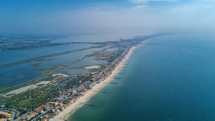 Aerial top view of beach resort town on Mediterranean sea from above, vacation and tourist holiday destination in France
