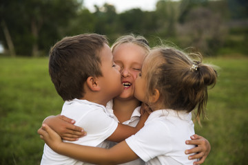 Happy kids. Emotions, hugs, real childhood friendship.