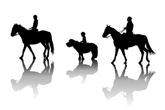 Family riding horses and pony