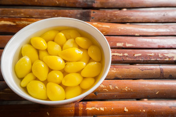 A Sweet  Ginkgo Nut Soup ON bamboo table image top view