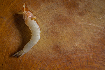 The Fresh shrimp cooking on wood plate top view
