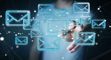 Businessman holding and touching floating emails 3D rendering