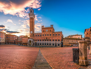 Beautiful panoramic photo of Piazza del Campo Europe's greatest medieval squares in Siena, Tuscany, Italy on a sunrise - obrazy, fototapety, plakaty