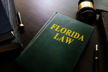 Florida law and gavel on a table.