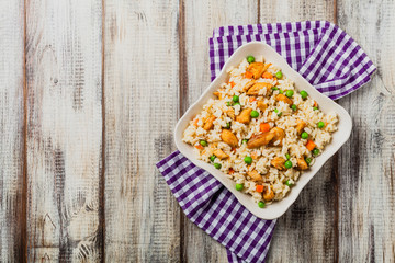 Delicious risotto with chicken and green peas.