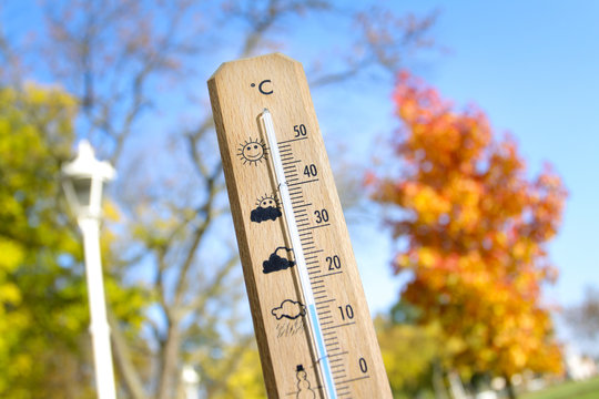 nice weather in the autumn shown with mercury thermometer