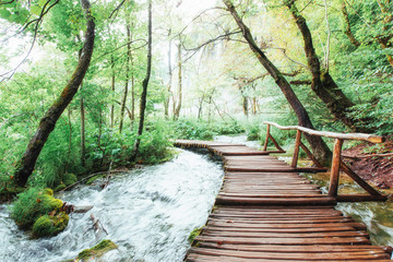 Plitvice Lakes National Park, tourist route on the wooden flooring along the waterfall