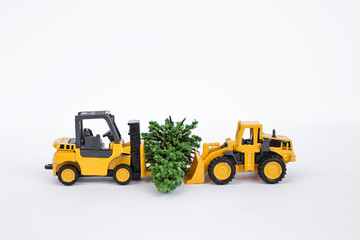 Two truck moving Christmas tree isolate on white background