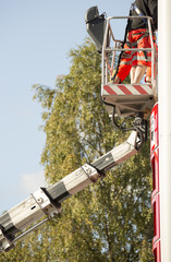 Workers in aerial work platform