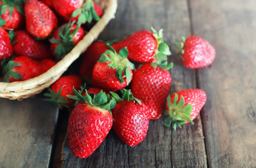 fresh strawberries on a wooden background