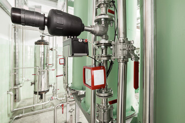 Industrial filtering equipment. Pipelines and stop valves in stainless steel.