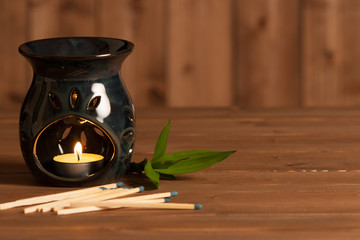Aroma Lamp With Burning Candle. Aromatherapy. Spa Room.