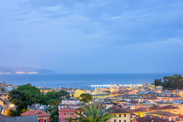 Fototapeta na wymiar Beautiful night view to Santa Margherita Ligure city and sea in Italy