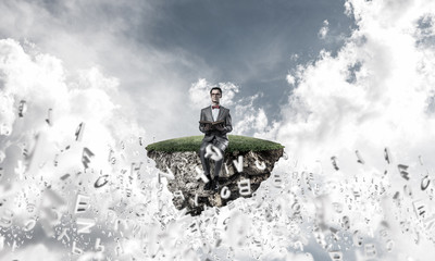 Obraz premium Young businessman or student studying the science and symbols fl