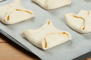 Cooking Of Homebaked Hungarian Cheese Puff Pastry Parcels.