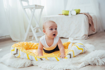 Bedding for children. The baby sleeps in bed. A healthy little baby soon after birth.