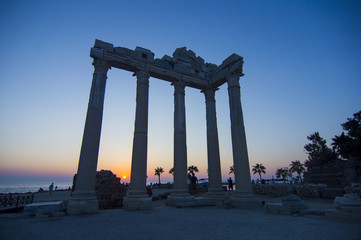 Fototapeta premium Temple of Apollo with a beautiful sunset background, in Side, Antalya, Turkey.