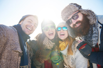 Portrait of four friends in winter clothing