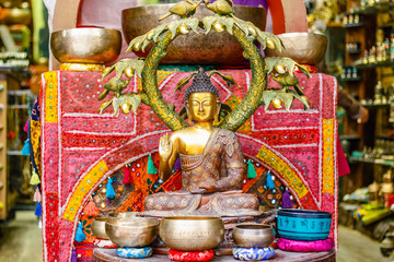 Decorative bronze Buddha statue on display at Camden Market in London