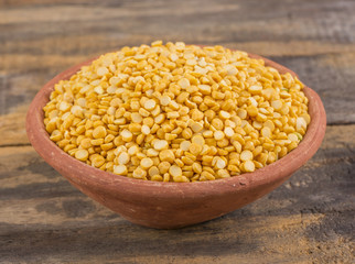 close up of seeds of husked brown gram pulse
