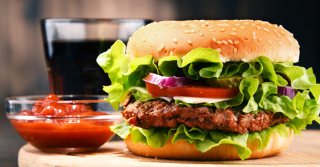 Homemade hamburger with cheese and fresh vegetables