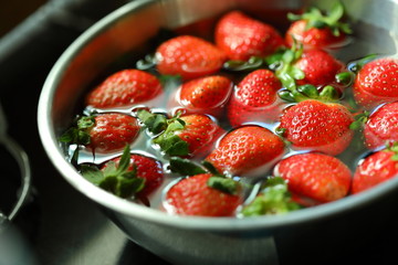 strawberry red fruit cleaning water