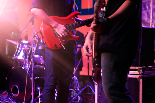 Guitarist on stage for background, soft and blur concept