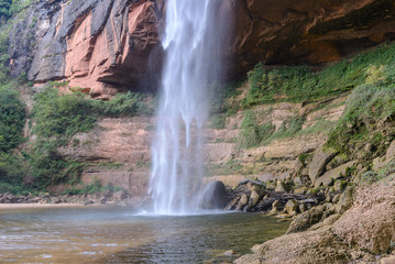Fototapeta na wymiar Waterfall at Jardin de las Delicias (Garden of Delights), Santa Cruz, Bolivia