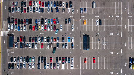 Aerial top view of parking lot with many cars from above, transportation and urban concept   © Iuliia Sokolovska