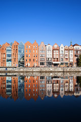 Gdansk City Houses With Mirror Reflection In Water, Poland