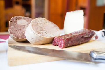 assorted sausages and cheeses