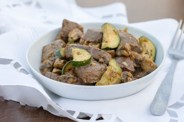 Marinated beef with zucchini and mushrooms