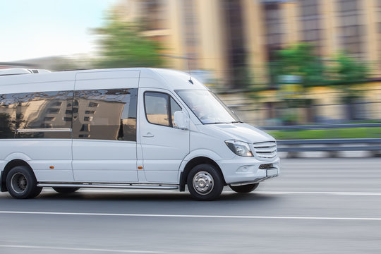 minibus goes on the city street