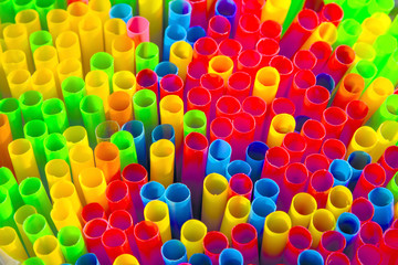 photo colored plastic beverage cans stand tightly on the storefront for sale