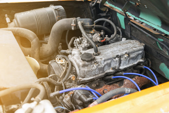 detail of old forklift engine in the garage
