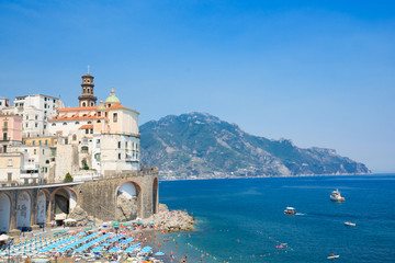 summer Atrani beach with sea water, Italy